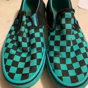 Vans black and teal slip ons
